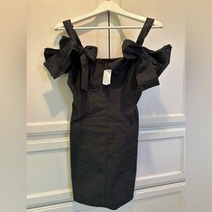 BNWT Urban Outfitters Kimchi Blue S Minidress. Black with off shoulder and bows
